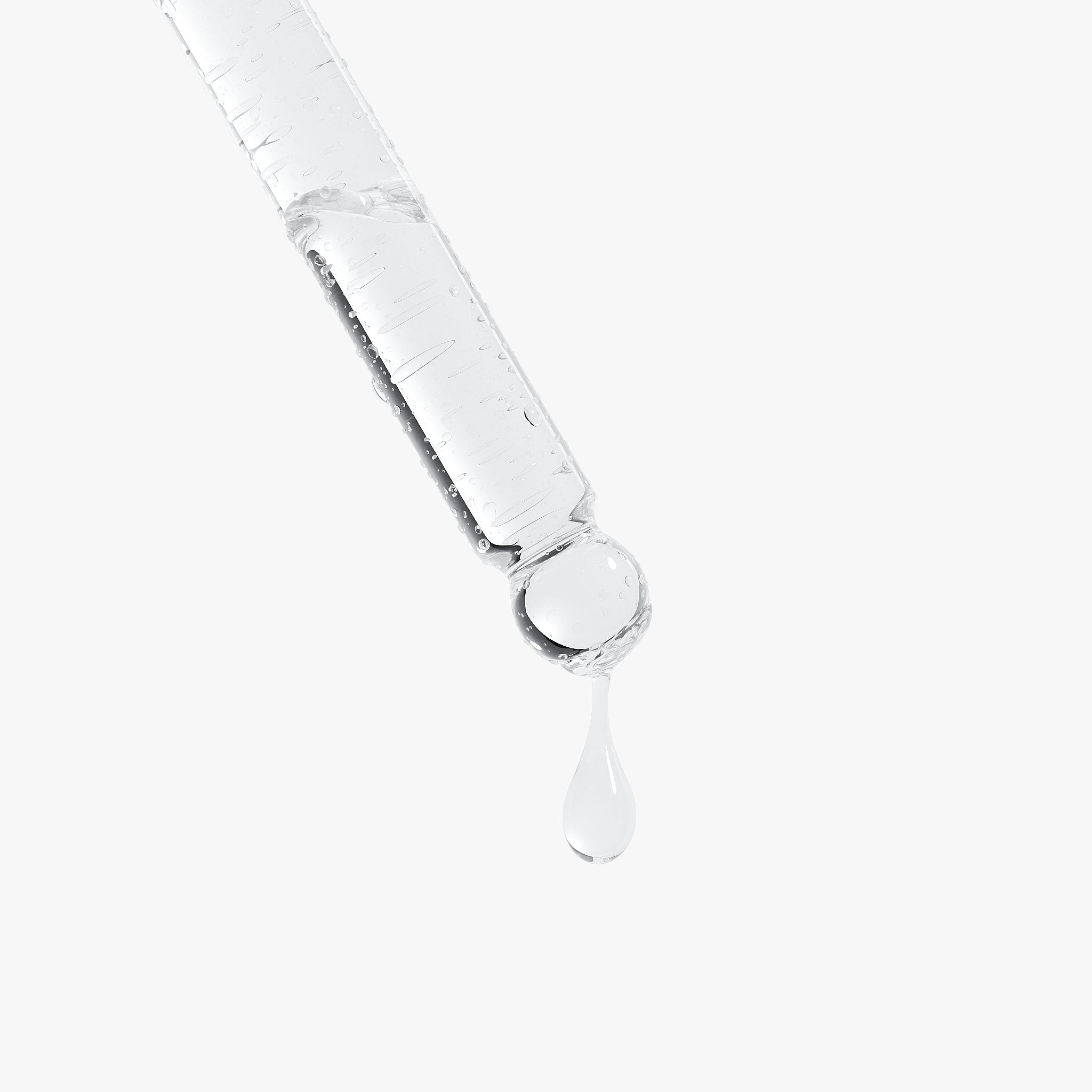 An opened capsule with beige powder spilling out on a white background.